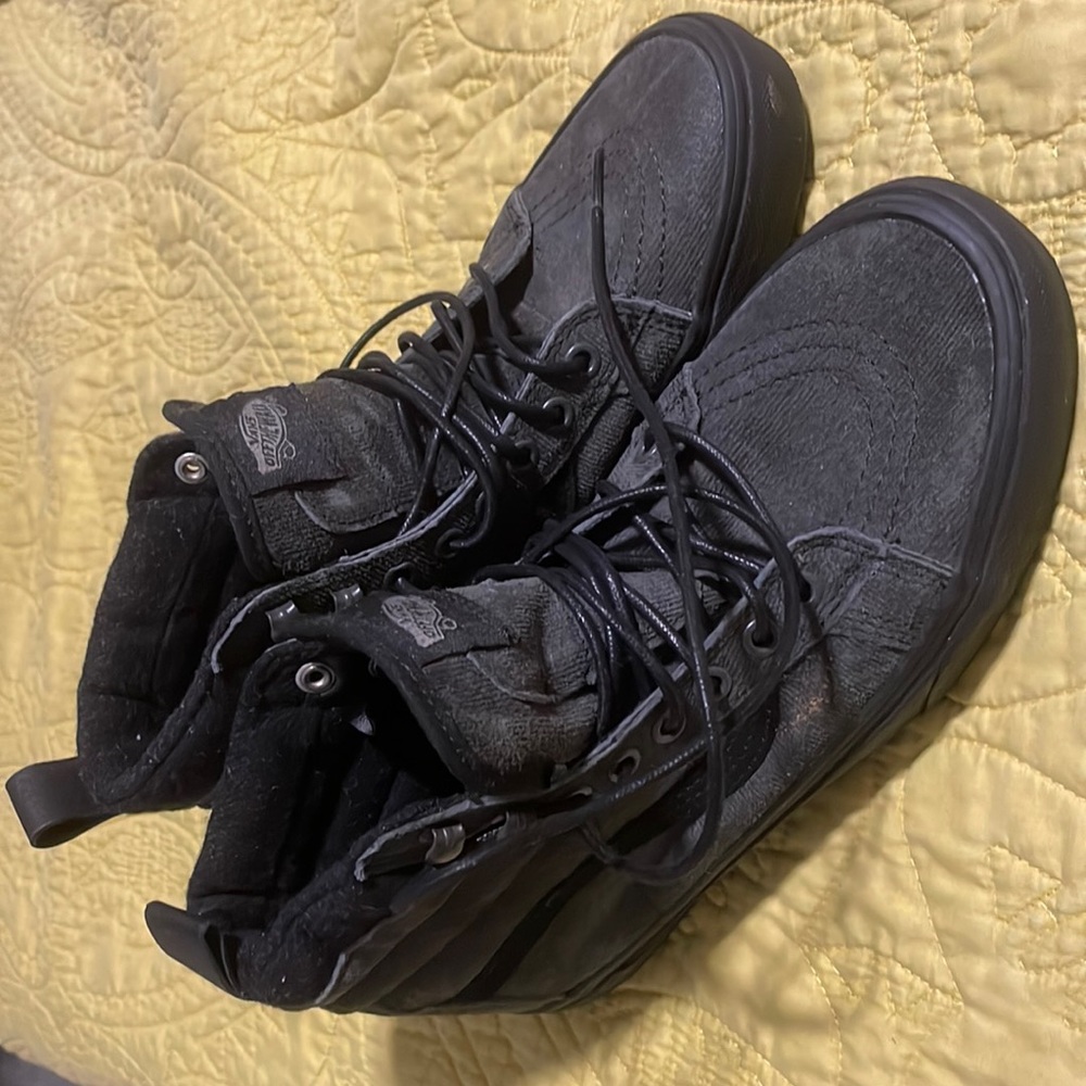 Black Vans with leather laces